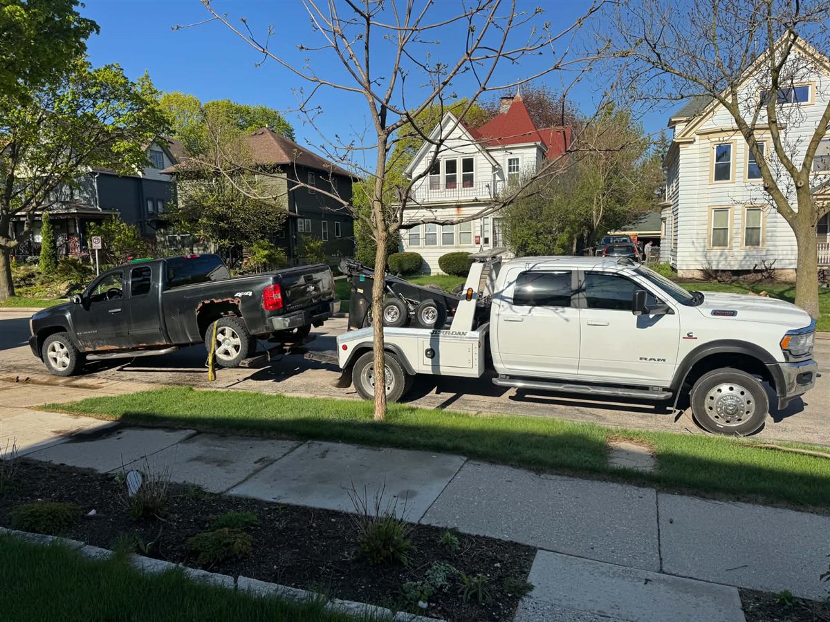 we buy junk cars Milwaukee, rusted Chevy Silverado picked up from a city street